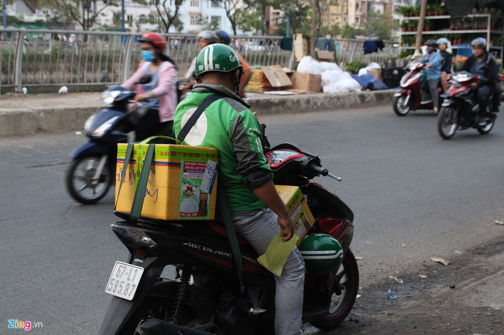 Nhung nguoi giu nhip song Ha Noi, Sai Gon dip Tet hinh anh 2